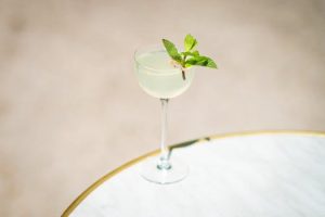 Mint sprigs garnish summer mojitos and desserts