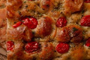 Rosemary perfumes homemade focaccia for sharing